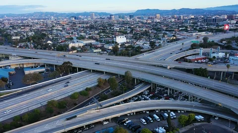 Aerial view of empty Los Angeles freeway and streets due to coronavirus pandemic Stock Footage 127216405