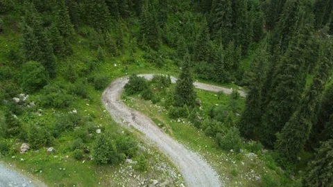 Aerial View Of Empty Mountain Road Serpentine. Kyrgyzstan, Karakol Stock-Footage 332937605