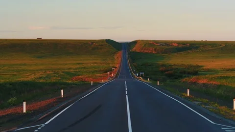 Aerial view of empty paved road in rural fields. backward follow drone video 4k Stock Footage 90048115