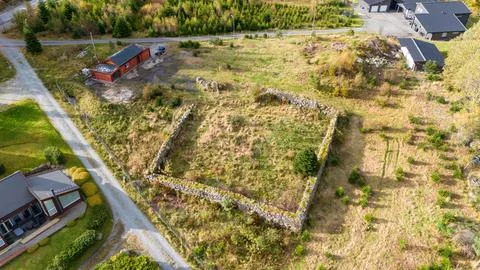 Aerial View of an Empty Plot Surrounded by Greenery Stock Photos