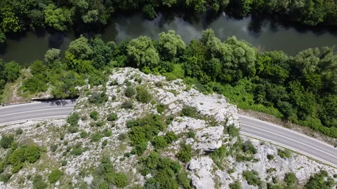 Aerial view of empty road and tunnel in the mountain and dark falling on the sky 스톡 동영상 133022289