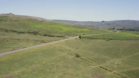 Aerial view of an empty road at Dartmoor National Park in Devon, UK. Stock Footage 92718863