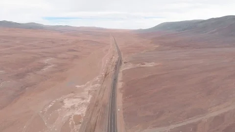 Aerial view of empty road leading to horizon in Atacama desert Chile. Drone Video stock 93786335