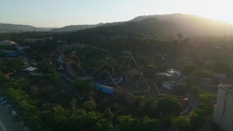 Aerial view of an empty roller coaster at sunset Vidéo 341076627