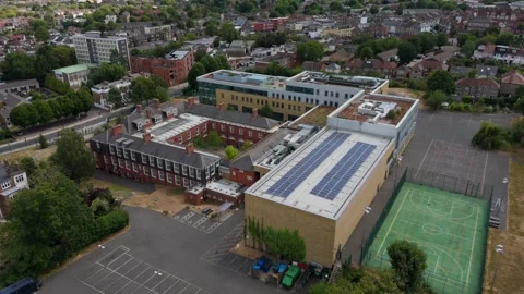 Aerial View Empty School With Solar Panels in Summer, UK Stock Footage 341320232