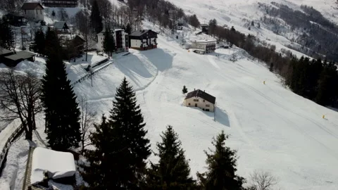 An aerial view of an empty ski resort with no people due to COVID19 restrictions Stock Footage 152985687