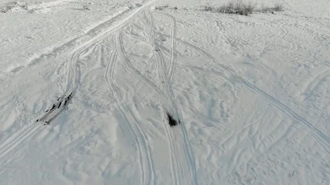 Aerial view of empty snowmobile tracks Stock Footage 122114861