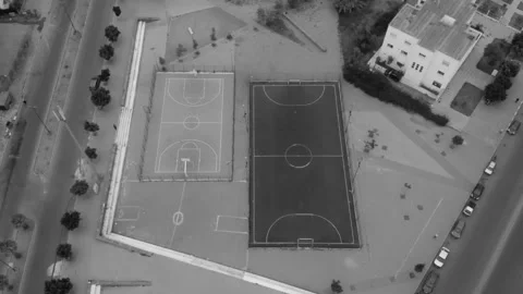 Aerial view of empty soccer and basketball staduim in the street Stock Footage 157316797