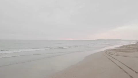 Aerial view on the empty sunset beach, Lisbon, Portugal Stock Footage 232485789