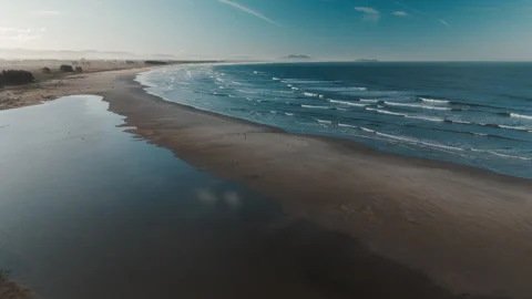 Aerial view of the empty wide sandy beach on the south of Santa Catarina state Stock Footage 337286754