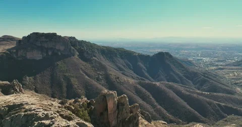 Aerial view of the endless mountains around the Mexican city of Guanajuato. Stock Footage 251395376