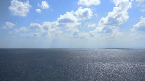 Aerial view of endless ocean or open sea with clouds - Red Sea Stock Footage