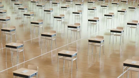 Aerial view of endless rows of desks with chairs. School qualification exam.Test Stock Footage 133465869