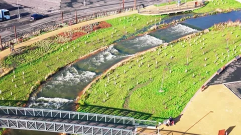 Aerial view of engineered River Avon cascades and landscaped flood channel in Stock Footage 331973567