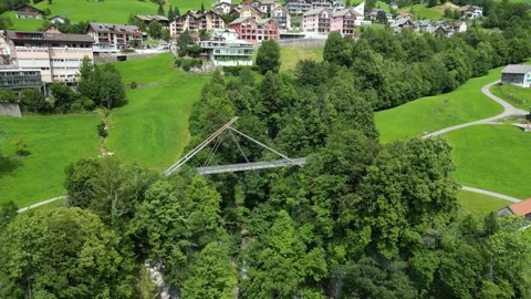 Aerial view of engineering marvel of suspension bridge connecting two Stock Footage 248989249