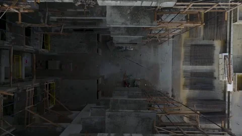 Aerial View: Engineers supervise workers at a residential site, preparing a Stock Footage 296043993