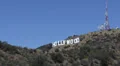Aerial View of Entertainment Symbol Holywood Sign Los Angeles Hills LA USA Sunny HD Footage