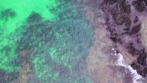 Aerial view of Eongtto Waterfall in Jeju Island, South Korea Stock Footage 296576420