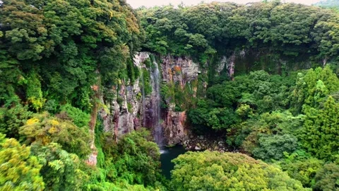 Aerial view of Eongtto Waterfall in Jeju Island, South Korea Stock Footage 296578441