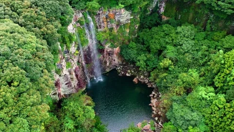 Aerial view of Eongtto Waterfall in Jeju Island, South Korea Stock Footage 296579344