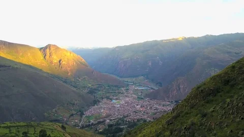 Aerial View of Epic Mountains, Sky, Clouds and Old Peruvian City at Sunset Stock Footage 75746752