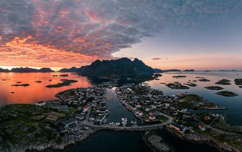 Aerial view of an epic sunset over Henningsvaer fishing village in Lofoten, N Stock Photos
