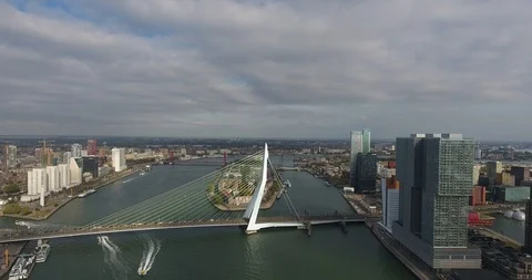 Aerial view of Erasmus bridge, river and City Stock Footage 99272691