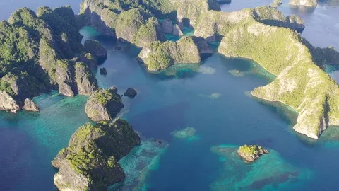Aerial View of Eroded Limestone Islands in Raja Ampat, Indonesia Stock Footage 100273484