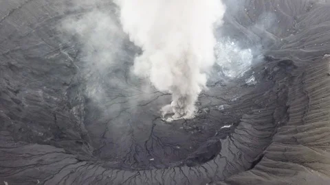 The aerial view of erupting Mt. Aso in Kagoshima, Japan, October 2019. Stock Footage 117280070