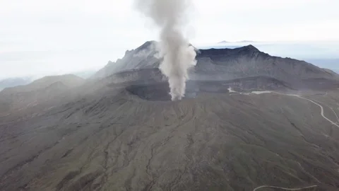 The aerial view of erupting Mt. Aso in Kagoshima, Japan, October 2019. Stock Footage 117280207