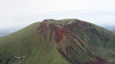 The aerial view of erupting Mt. Aso in Kagoshima, Japan, October 2019. Stock Footage 117280314