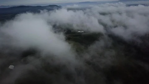 The aerial view of erupting Mt. Aso in Kagoshima, Japan, October 2019. Stock Footage 117281133