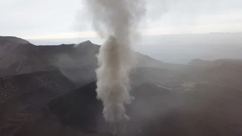 The aerial view of erupting Mt. Aso in Kagoshima, Japan, October 2019. Stock Footage 117281795