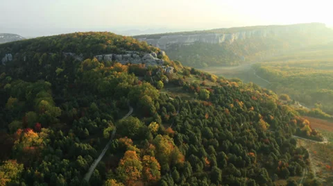 Aerial View: Eski-Kermen cave city, near Bakhchisaray, Crimea. Autumn 2013 Stock Footage 36657387