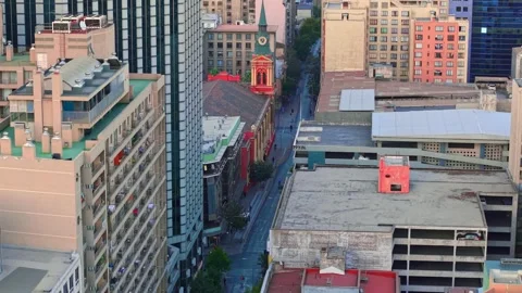 Aerial view establishing 70mm isolating and compacting the buildings and the Stock-Footage 306384084