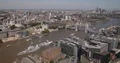 Aerial View Establishing Shot of London Skyline with Tour Boats on Thames River 4k or 4k+ Resolution