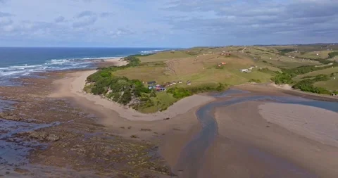 Aerial view of an estuary in the Eastern Cape Stock Footage 298217489