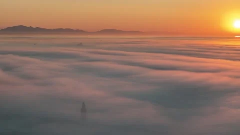 Aerial view of Europa Point lighthouse above clouds, Gibraltar. Stock Footage 346643202