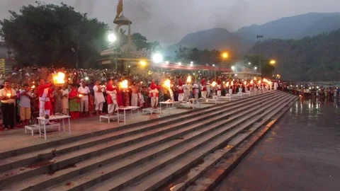 Aerial view of the evening Ganga Aarti at Triveni Ghat Stock Footage 327439853