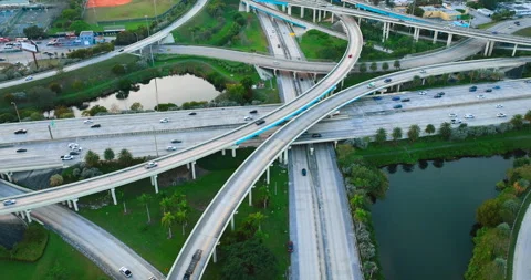 Aerial view of evening multi-level junction of roads with bridges. Video stock 261026269