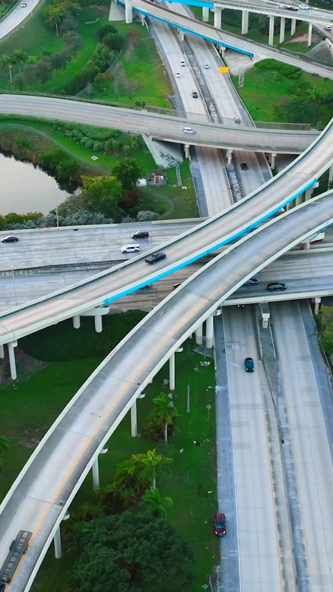 Aerial view of evening multi-level junction of roads with bridges. Stock Footage 267719776