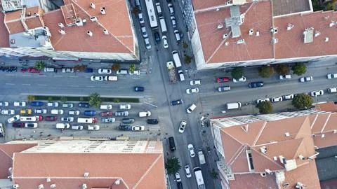 Aerial view of the evening traffic in the city center. vehicles and pedestrians Stock Photos