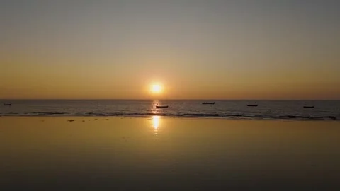 Aerial view of evening view at the beach. Drone footage of sun set at the beach. Stock Footage 258470111