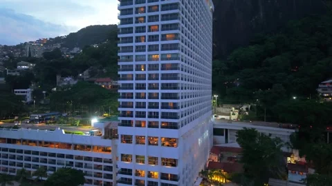 Aerial view of Evening View of Luxury Hotel Tower at Praia do Vidigal in Rio de 库存影片 334816545