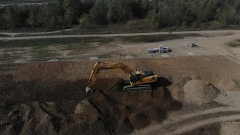 Aerial view of the excavator on the construction site. Stock Footage 125536604