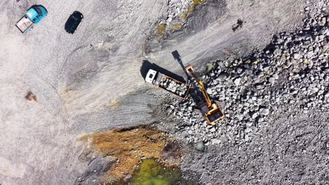 Aerial view of excavator loading stone at Black Sea coastal site, Bulgaria Vídeos de archivo 345151374