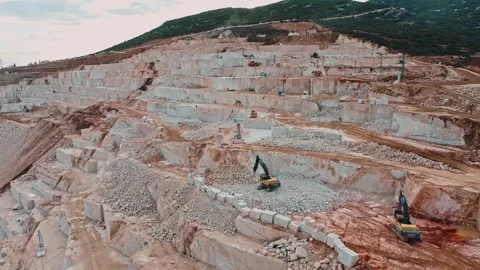Aerial View of Excavators at Work in Marble Quarry Stock Footage 304835139