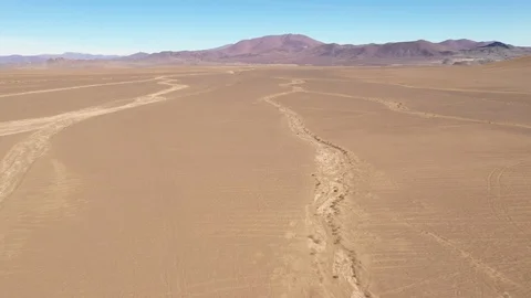 Aerial view exploring Atacama Desert ground, an infinite arid landscape Vídeo Stock 112594588