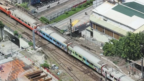 Aerial view of a Express train in Tainan, Taiwan. Stock Footage 220600935