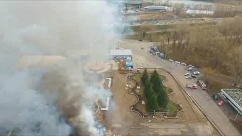 Aerial view of the extinguishing of a large fire on the roof of the building. Video stock 89563208